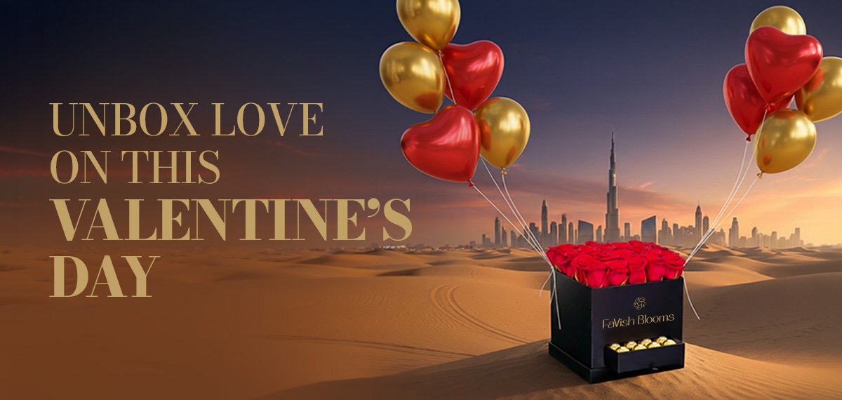 Valentine's Day luxury gift box with red roses and gold heart balloons Dubai - FaVish Blooms